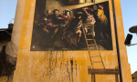Sfregiato il murales del Caravaggio: "Un gesto inaccettabile, non resterà impunito"